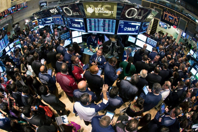A crush of traders in a trading pit of the New York Stock Exchange. 