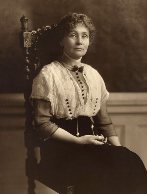 Emmeline Pankhurst in around 1913. She is a white woman with dark hair.
