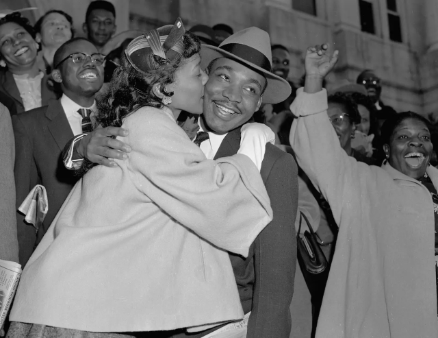King receives a kiss from his wife, Coretta Scott King, on March 22, 1956, after being released from a Montgomery jail