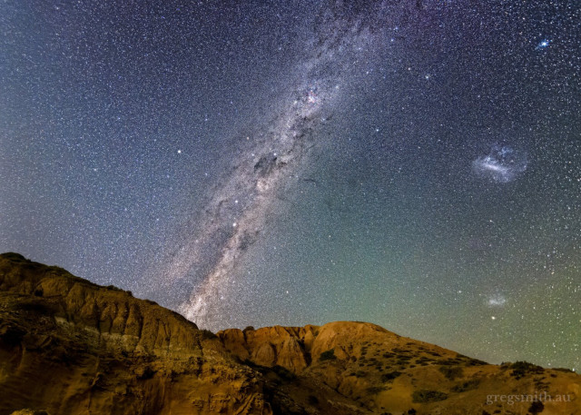 The Milky Way over some interesting rocky hills.