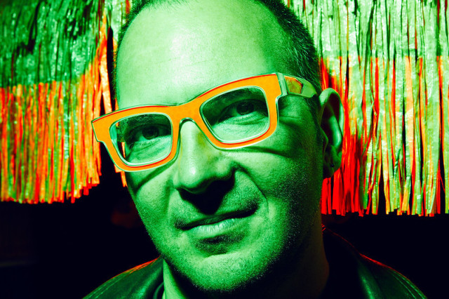Photo portrait of Cory Doctorow with a green color shift