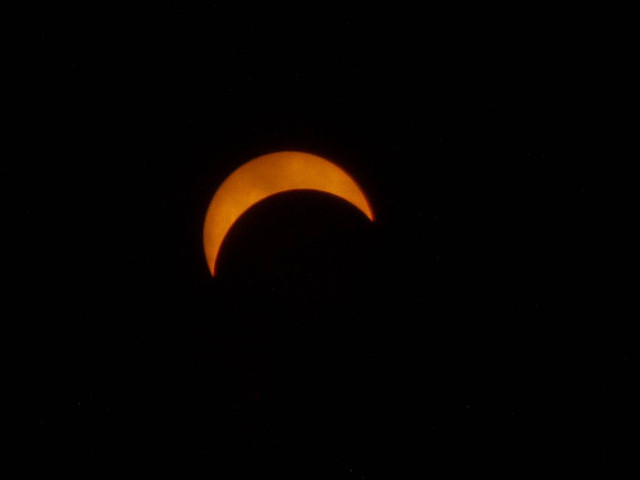 The sun is almost covered by the moon in the solar eclipse