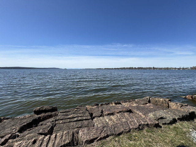 A view of Saint Albans Bay on Lake Champlain. the bottom of the photo shows the rock they have laid to keep this park from eroding away