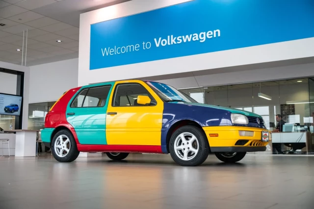 1996 Volkswagen Golf Harlequin. A limited edition version of VW's four-door hatchback with all the body panels painted different colors.