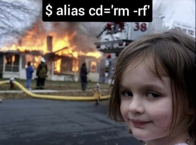Little girl looking like a troublemaker into the camera. Words read "$ alias cd='rm -rf'