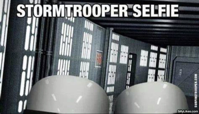 "Stormtrooper Selfie"

A picture of a hallway with just the top of two Stormtrooper helments.