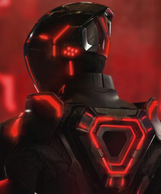 A person in a TRON suit, the lighting is all red.