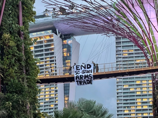 A photo of a banner at Marina Bay Sands with the text End Singapore-Israel Arms Trade