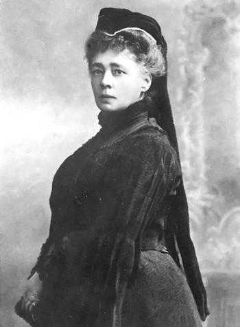 photo of Baroness Bertha von Suttner. She is a white woman with light hair, wearing what looks like Victorian mourning clothes.