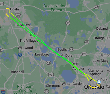 A diagonal looping flight path from Orlando to Ocala drawn over a google map view.