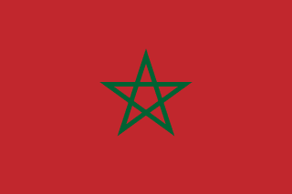 The flag of Morocco, which consists of a green pentagram on a red background.