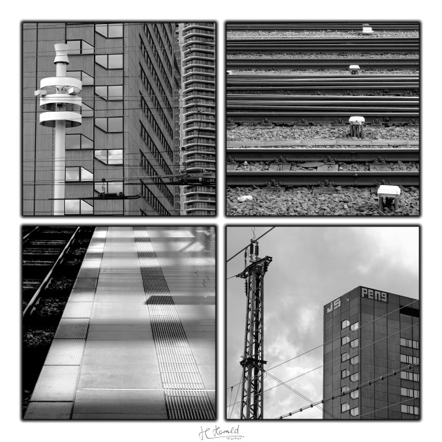 Black and white collage of four square pictures of details within and around Frankfurt central station. Upper left and lower right are pylons in front of highrise buildings. Upper right shows horizontal tracks and 4 electric boxes. Lower left is a platform with horizontal shadows.