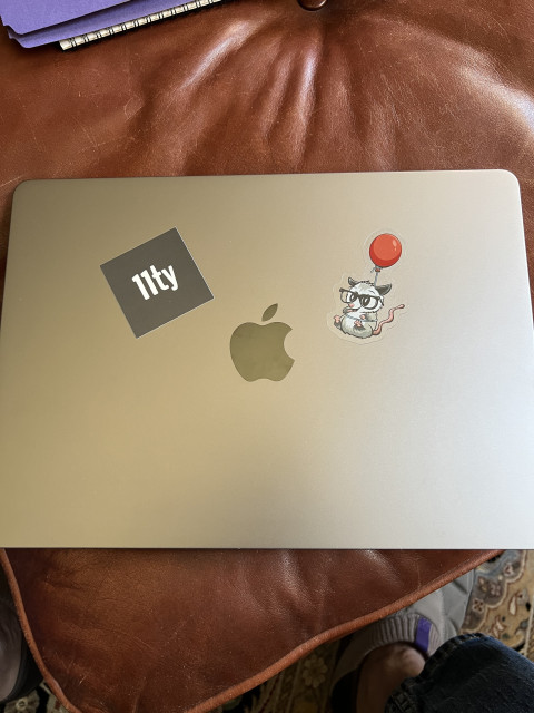 MacBook Air with 11ty stickers