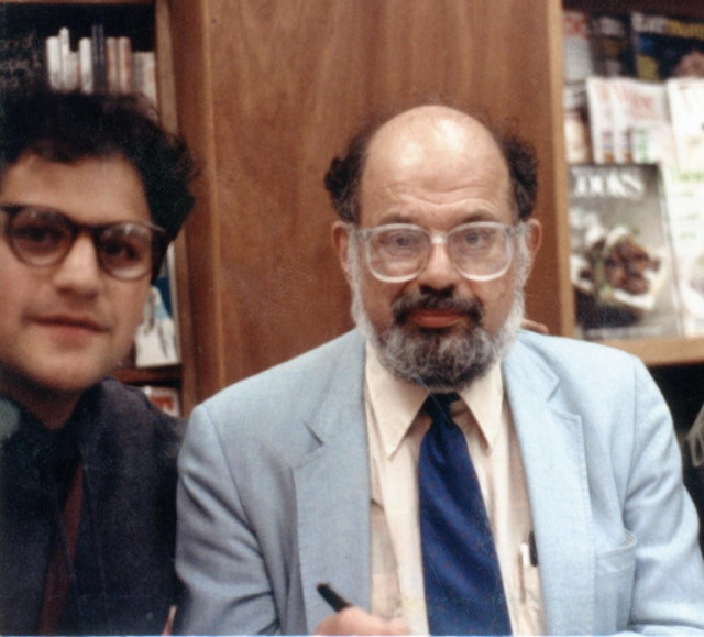 Young Steve Silberman with glasses with Allen Ginsberg in a blue jacket and tie at the Booksmith in San Francisco.