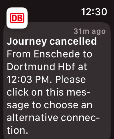 Screenshot einer Meldung auf der Apple-Watch:
„Journey cancelled From Enschede to Dortmund Hbf at 12:03 PM. Please click on this message to choose an alternative connection.“