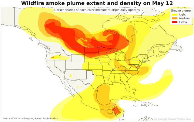 Map of North America, showing wildfire smoke plume extent and density on May 12. Areas of heavy smoke are indicated throughout much of central Canada and drifting into the U.S. upper midwest.