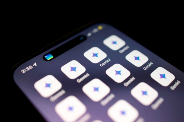 An image of an iPhone with the Gemini app widget displayed on screen. (Image by Solen Feyissa on Unsplash.)