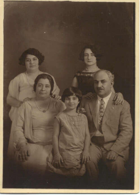 76 year old photograph of a Levantine family. Pictured are my great grandmother and great grandfather with their 3 surviving daughters, the youngest of which became my grandmother. 