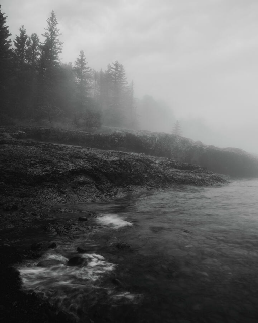 Black and white foggy coastline in Minnesota photograph by Dan Sproul.