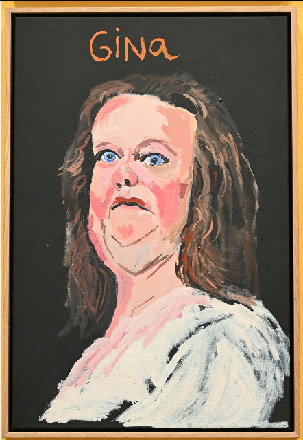 A colour, painted portrait of Gina RInehart, with “Gina” written above it. Here, she’s shown with a receding hairline, broad forehead, a more slender face, but again, multiple chins.
