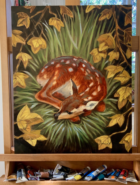 An oil painting of a baby deer curled up in tall green grass. With golden ivy leafs framing the scene. 