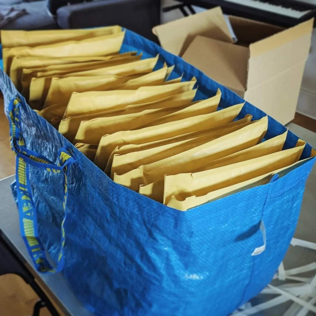 Photograph showing an IKEA bag filled with A5 reinforcement envelopes. 