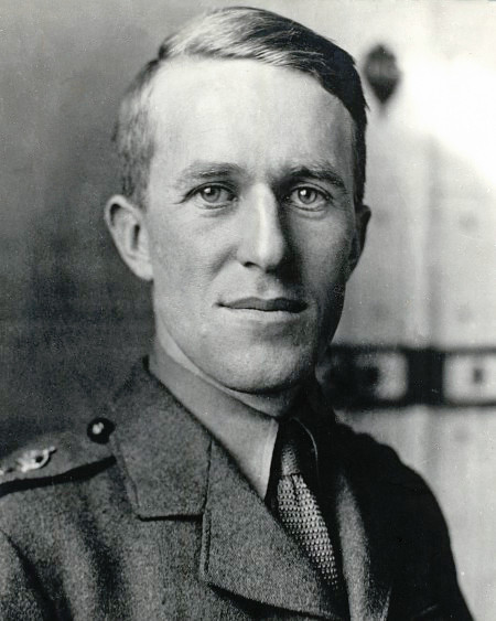 British Army File photo of T.E. Lawrence.

A man in uniform standing proudly in a black and white photo.