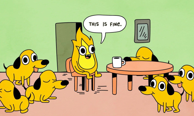 A cartoon flame sits in a chair in a room with a door and a window. It is surrounded by cartoon dogs. The flame says "This is fine" in a speech bubble.