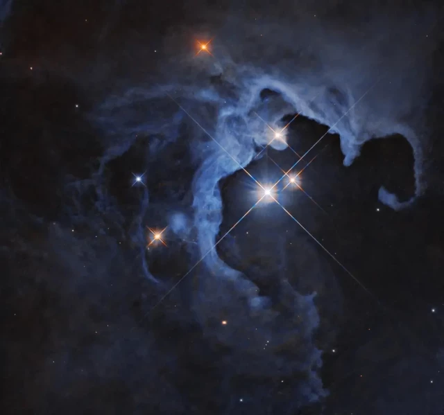 This NASA Hubble Space Telescope image captures a triple-star star system.
NASA, ESA, G. Duchene (Universite de Grenoble I); Image Processing: Gladys Kober (NASA/Catholic University of America)