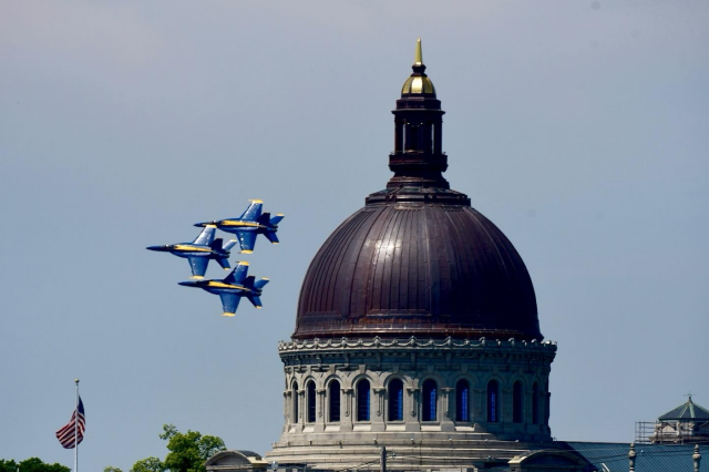 Blue Angels flying in front of the Navel Academy chapel dome  