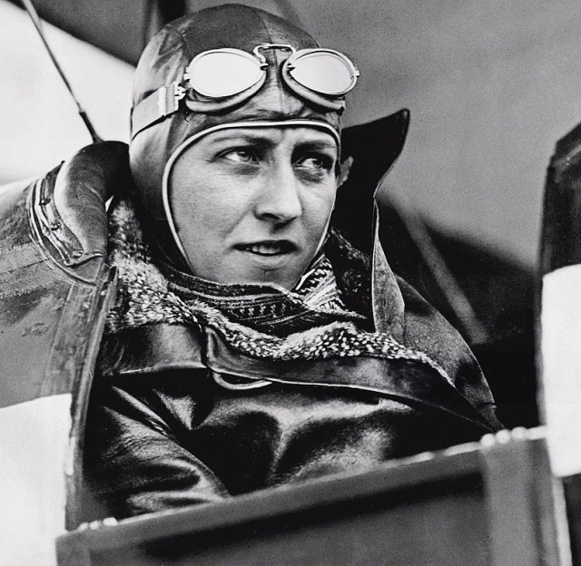 English Aviatrix Amy Johnson in her Black Hawk Moth leaving Australia for Newcastle, 14 June 1930

Woman in aviation gear with helmet and goggles.
