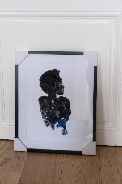 Image of the same image framed for exhibition. 