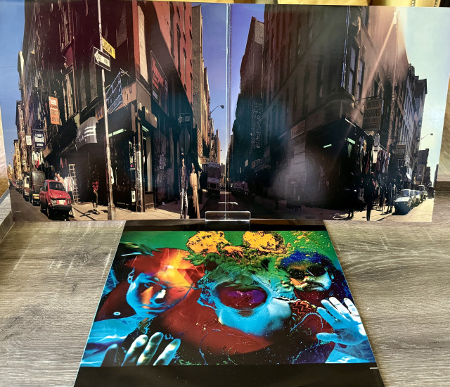 Unfolded gatefold showing the two inner panels. Another wide angle shot of 80s Brooklyn

Below is album sleeve with a picture of the three band members as taken underwater and in oversaturated color effect
