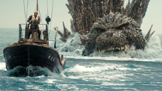Movie still of Godzilla chasing the boat, from the movie Godzilla Minus One.