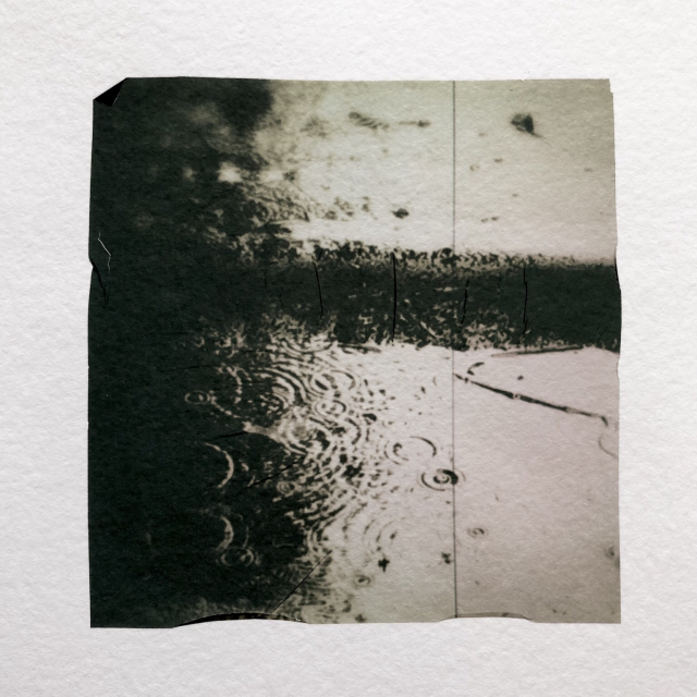 Rain on the floor. Polaroid emulsion lift.