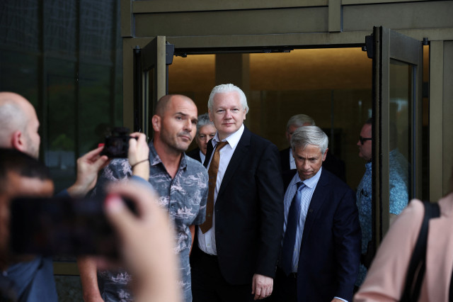 Julian Assange arrives in Australia