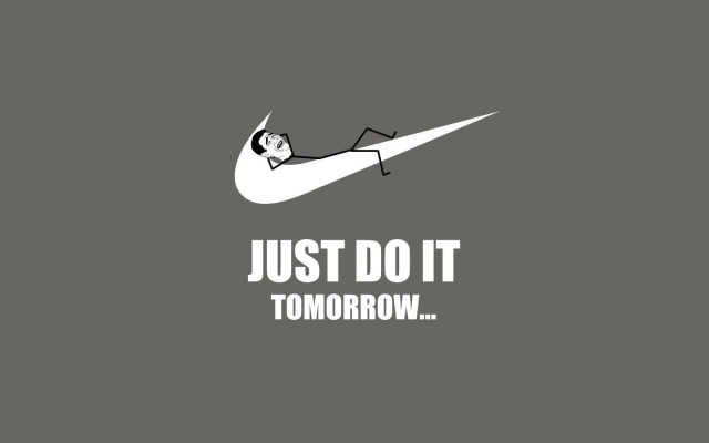 A parody of the Nike logo. Instead of the usual "Just Do It" slogan, it reads "Just Do It Tomorrow." The swoosh logo is present, but a cartoon character is reclining on it, appearing relaxed and lazy, contributing to the humorous twist on the original motivational message.