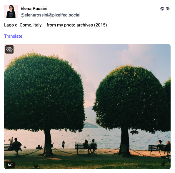 a screenshot of my first Pixelfed post (a photo of Lake Como) as it appears in my Mastodon feed