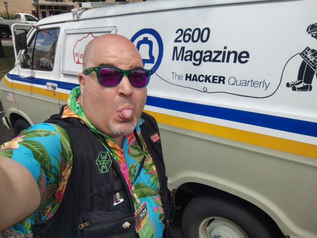 Photo of the Undersigned looking sweaty but happy while posing with the 2600 van.