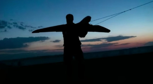 Ukrainian soldier and drone