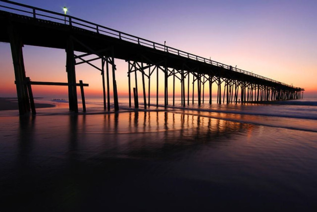 North Carolina Beach Pier - Sunrise
South of Wilmington NC

Yes even during vacation I still get up early for capturing great pictures.

Carolina Beach Pier Sunrise Carolina Beach NC is a small picturesque resort town in the fare southeast corner of North Carolina. The pace in this small town is perfect for those who want to relax and rejuvenate.

A few of the local attractions are
- The boardwalk
- Fort Fisher
- Kure Beach Pier
- North Carolina Aquarium at Fort Fisher
- Carolina Beach State Park
- Carolina Beach Pier

Image: 
https://fineartamerica.com/featured/north-carolina-beach-pier-sunrise-wayne-moran.html

Read more: 
https://waynemoranphotography.com/photography/the-beauty-of-north-carolina-beaches/

#sunrise #Pier #beach #ocean #CarolinaBeach #Wilmington #NorthCarolina #nature #hiking #travel #travelphotography #landscapephotography

#AYearForArt #buyintoArt #fineart #art #FillThatEmptyWall #homedecorideas #homedecor #wallartforsale #wallart #homedecoration #interiordesign #interiordesignideas #interiordesigner #colorful #greetingcards #giftideas #giftidea