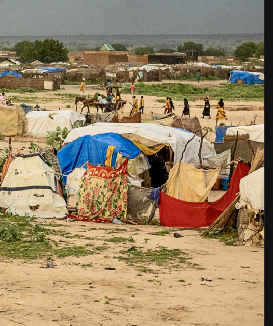 Tent camp on the border with Sudan with starving people & millions on the run.