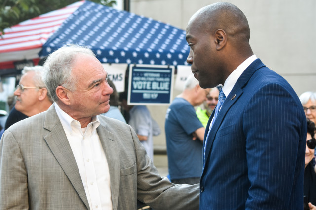 Sen. Tim Kaine (D-VA) and Virginia State Sen. Aaron Rouse at a political rally in Arlington, Va.