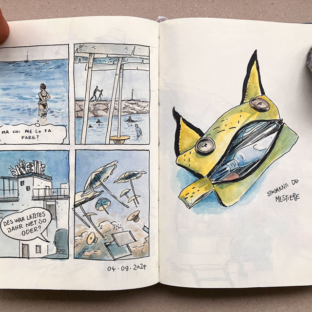 A photo of a sketchbook double-spread with a 4-panel comic on the left (see next image) and a yellow monster-shaped case with drawing utensils on the right.