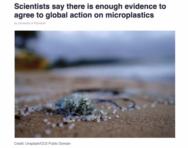 Screenshot from top of linked article. Headline reads: "Scientists say there is enough evidence to agree to global action on microplastics." Below this is a close-up photo of hundreds of microplastic particles captured in a fragment of a plastic fishing net on a beach.