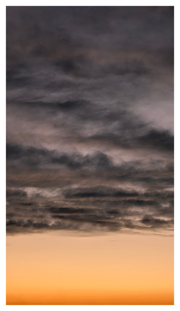 vertical section of the western sky at sunset. the lower third is a gradient of orange from pale to dark. above: charcoal gray horizontal clouds, some with faint, pale orange highlights.