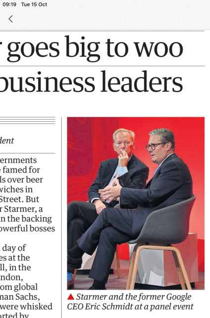 Clipping of newspaper article. Partial title “…goes big to woo … business leaders”. Photo of Eric Schmidt listening to Kier Starmer with his fingers over his lips. Caption: Starmer and the former Google CEO Eric Schmidt at a panel event.