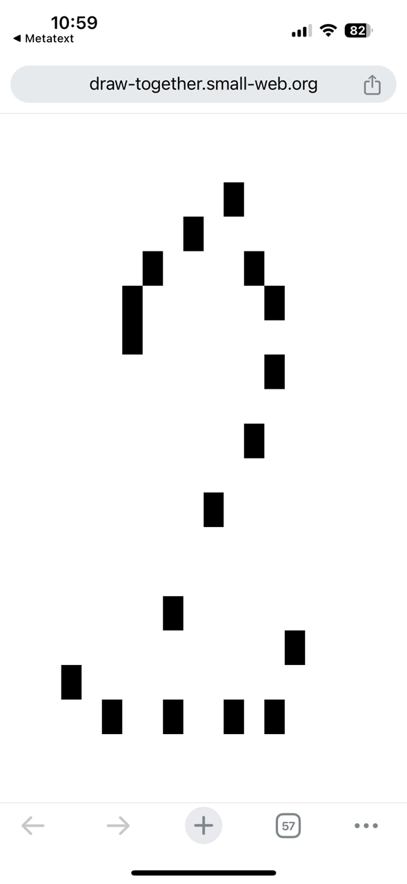 A blank space where almost random pixel blocks have been clicked forming perhaps a question mark over a smile.