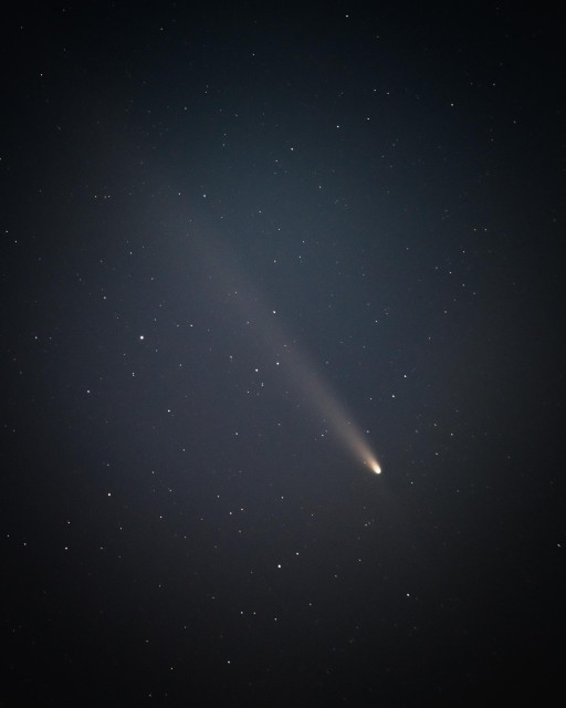 A photograph of comet C/2023 A3 Tsuchinshan-ATLAS showing its tail and a hint of its anti-tail.