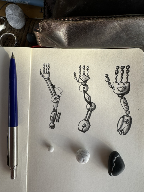 3 types of robot hands, photo of moleskine, pencil sketch